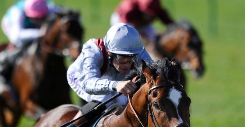 Richard Hughes riding Toronado wins at Newmarket racecourse on April