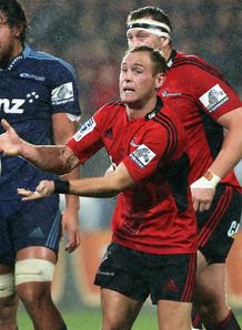 Crusaders nine Andy Ellis passing in the rain Crusaders nine Andy Ellis passing in the rain