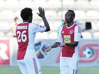 Khenyeza and Billiat celebrate Ajax's opener