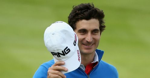 Canizares has slender lead