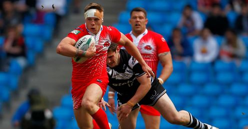 Theo Fages L of Salford City Reds makes a break Theo Fages L of Salford City Reds makes a break