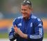 Giles happy to aim high