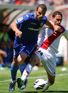 Valencia maintain pressure