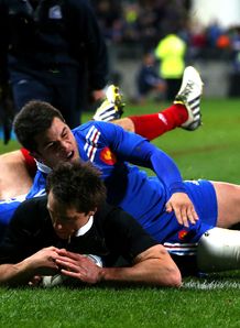 Ben Smith of the All Blacks scores a try despite the tackle of Brice Dulin of France Ben Smith of the All Blacks scores a try despite the tackle of Brice Dulin of France