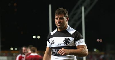 Brits cited for punching Farrell
