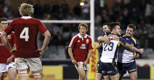 The Brumbies celebrate beating the Lions