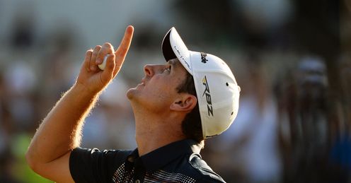 Poignant: Justin Rose pays tribute to his late father after winning his first major