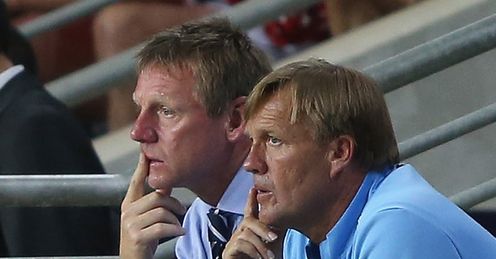 Problems: Stuart Pearce and Steve Wigley watch England lose to Norway