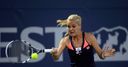 Radwanska battles into semis