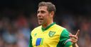 Wigan complete Holt signing