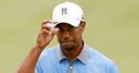 Red-hot Woods leads by seven