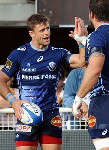 Castres scrum half Rory Kockott celebrates with teammates Castres scrum half Rory Kockott celebrates with teammates
