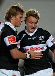 Fred Zeilinga of the Sharks celebrates his try with Charl McLeod Fred Zeilinga of the Sharks celebrates his try with Charl McLeod