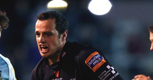 Dan Evans of Dragons charges Dan Evans of Dragons charges