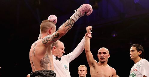 Burns raises his hands with Beltran expecting - like the crowd -the world title to slip away