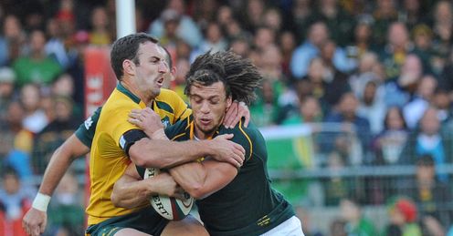 Zane Kirchner of the Springboks battles with Nic White of the Wallabies Zane Kirchner of the Springboks battles with Nic White of the Wallabies