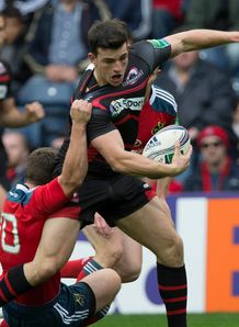 Edinburgh s Matt Scott is brought down by Munsters Ian Keatley Edinburgh s Matt Scott is brought down by Munsters Ian Keatley