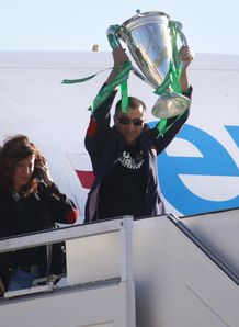 Toulon s rugby team president Mourad Boudjellal C holds the Heineken Cup trophy as he gets off the plane Toulon s rugby team president Mourad Boudjellal C holds the Heineken Cup trophy as he gets off the plane