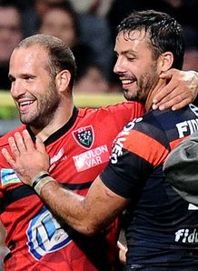 Toulon s scrum half Fred Michalak C speaks with Toulouse s fullback Clement Poitrenaud Toulon s scrum half Fred Michalak C speaks with Toulouse s fullback Clement Poitrenaud