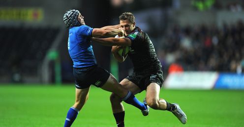 Ospreys player Ashley Beck breaks the tackles of Leinster scrum half Isaac Boss Ospreys player Ashley Beck breaks the tackles of Leinster scrum half Isaac Boss