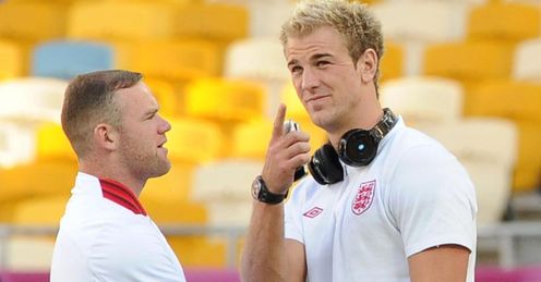 Rooney and Hart: Both make Redknapp's XI