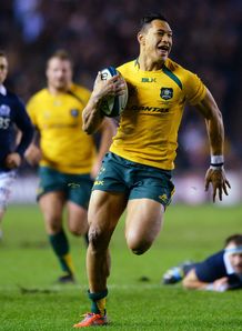 Israel Folau of Australia breaks free v Scotland Israel Folau of Australia breaks free v Scotland