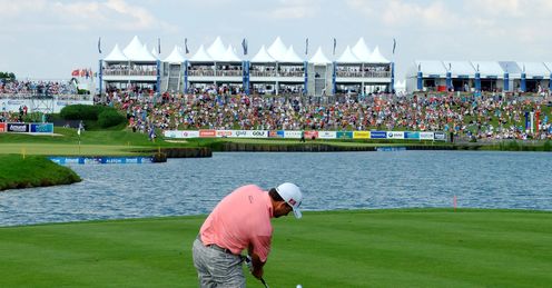 Graeme McDowell chips over the water at Le Golf National, the venue for the 2018 Ryder Cup