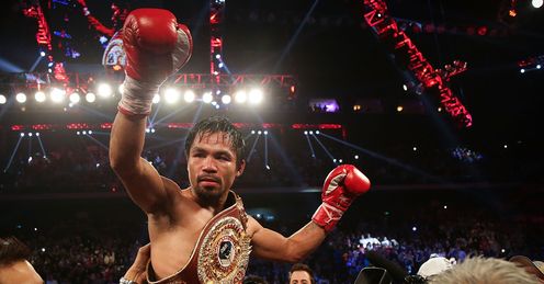 Manny Pacquiao celebrates victory over Brandon Rios