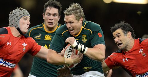 South Africa s Jean de Villiers C goes over for a try despite the efforts of Wales Jonathan Davies L and Wales Mike Phillips South Africa s Jean de Villiers C goes over for a try despite the efforts of Wales Jonathan Davies L and Wales Mike Phillips