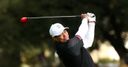Woods remains two-shots clear