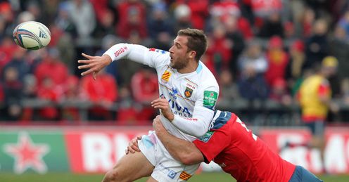 Perpignan s Tommaso Benvenuti L is tackled by Munster s Paul O Connell Perpignan s Tommaso Benvenuti L is tackled by Munster s Paul O Connell