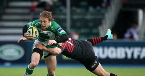Joel Hodgson of Newcastle breaks the tackle from Saracens Tim Streather Joel Hodgson of Newcastle breaks the tackle from Saracens Tim Streather
