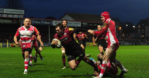 Saracens player Alex Goode goes over for the third try Saracens player Alex Goode goes over for the third try