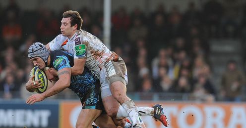 Tom Jones of Exeter Chiefs is tackled by Tom Grabham of Ospreys Tom Jones of Exeter Chiefs is tackled by Tom Grabham of Ospreys