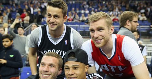 Football fans: the Arsenal quartet are at the NBA London game, but will they watch every game if it arrives?