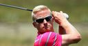Back to form Dyson takes lead