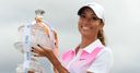 Woods lands maiden title