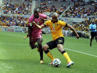 Nkosi (R): Puts in a cross