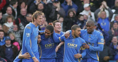 Portsmouth: former stars Peter Crouch, Glen Johnson and Sylvain Distin celebrate against Man City in 2009.