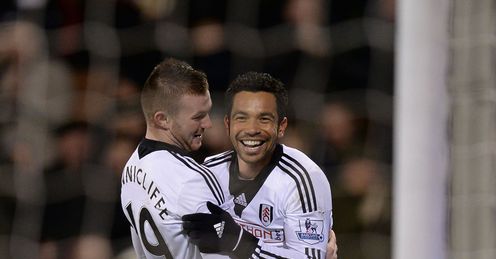 Richardson: the midfielder (R) is determined to help Fulham to safety