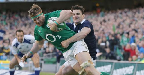 Jamie Heaslip Ireland tackled by Max Evans Scotland 2014 Jamie Heaslip Ireland tackled by Max Evans Scotland 2014