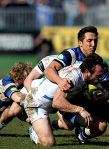 Bath centre Gavin Henson tackling Exeter full back Luke Arscott Bath centre Gavin Henson tackling Exeter full back Luke Arscott