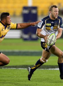 Jesse Mogg Brumbies evades the defence v Hurricanes Jesse Mogg Brumbies evades the defence v Hurricanes