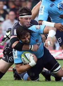Marcell Coetzee of the Cell C Sharks tackling Jacques Potgieter of the Waratahs Marcell Coetzee of the Cell C Sharks tackling Jacques Potgieter of the Waratahs