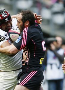 Toulouse flanker Akapusi Qera L vies for the ball with Stade Francais Julien Dupuy Toulouse flanker Akapusi Qera L vies for the ball with Stade Francais Julien Dupuy