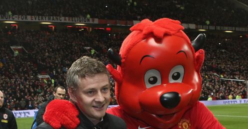 Ole Gunnar Solskjaer is enjoying Fred the Red's company, but Johnny is not a mascot fan