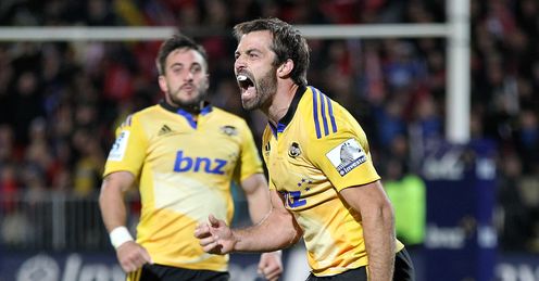 Conrad Smith R of the Hurricanes celebrates with team-mates Conrad Smith R of the Hurricanes celebrates with team-mates