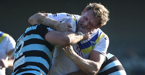 Warrington's Ben Westwood tries to break a tackle against London Broncos