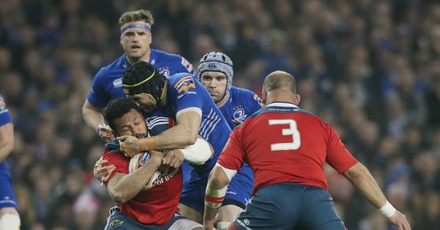 Leinster s Gordon D Arcy is tackled by Munster s Denis Hurley Leinster s Gordon D Arcy is tackled by Munster s Denis Hurley
