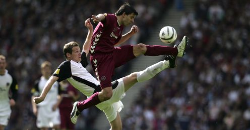 GLASGOW, UNITED KINGDOM - MAY 13: Takis Fyssas of Hearts battles with Kenny Deuchar of Gretna during the Tennents Scottish Cup Final between Heart of Midl